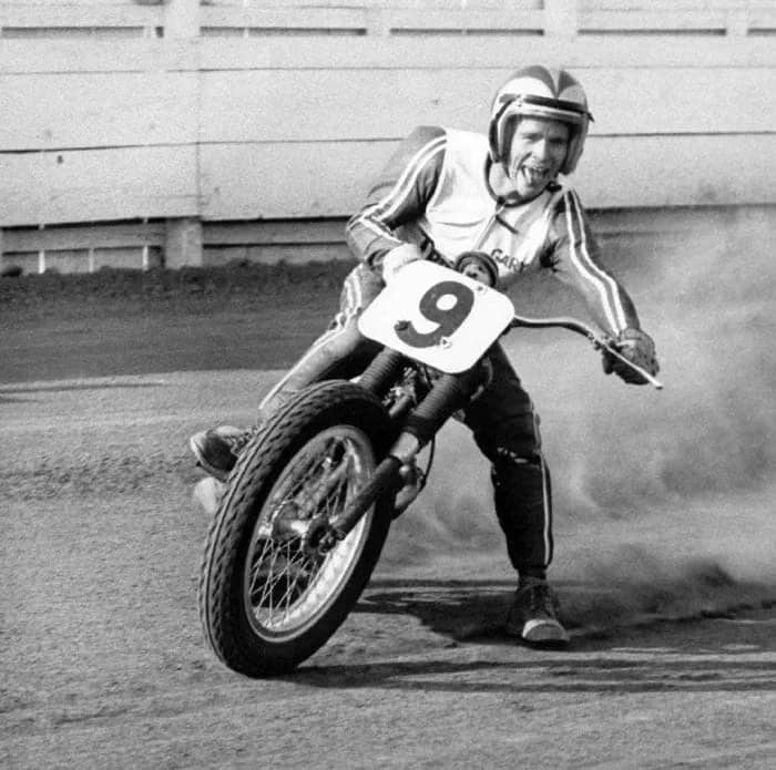 1967– Nixon, tongue out, sliding on Triumph number 9 