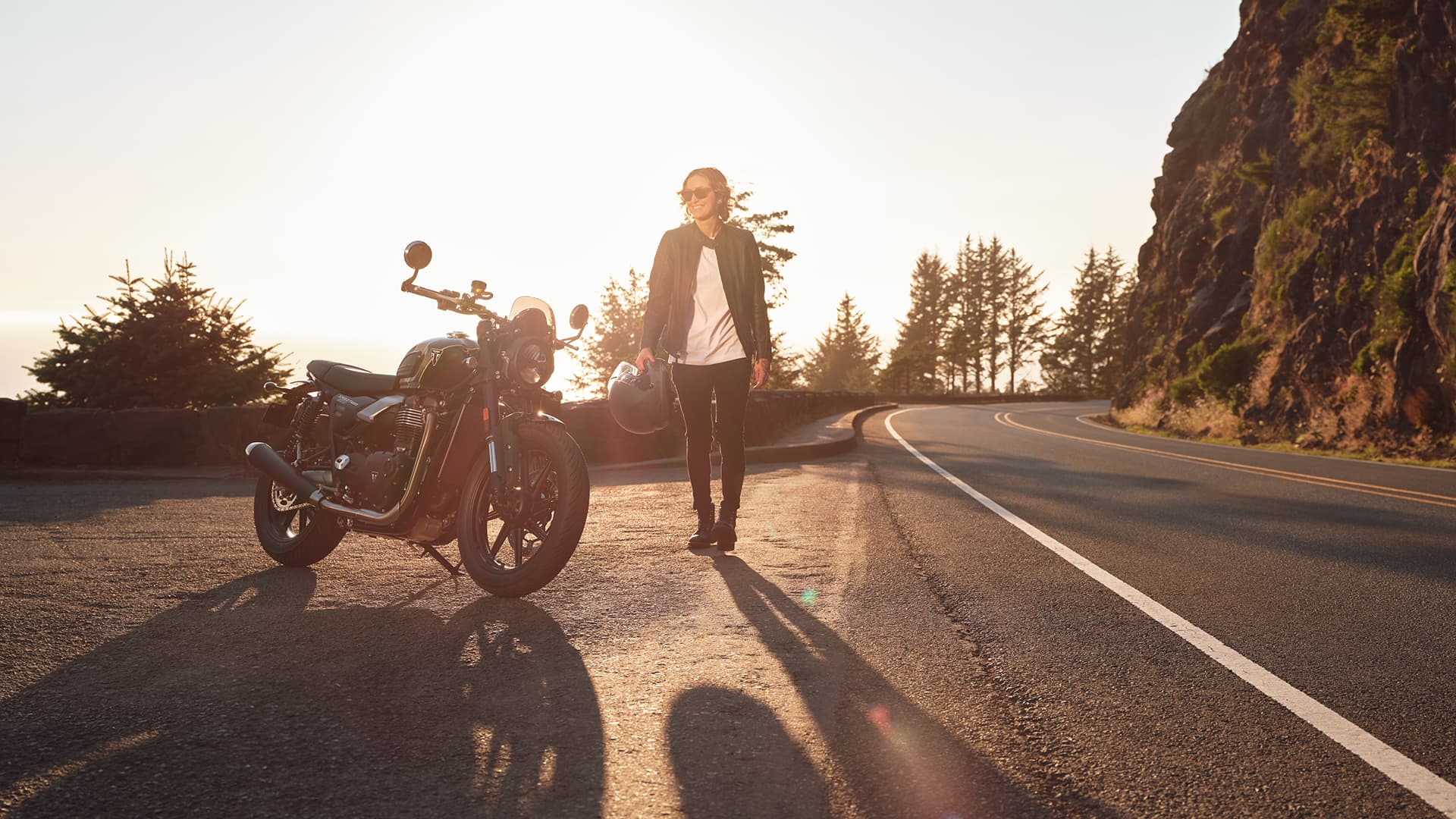 Rider walking towards Triumph Speed Twin 900