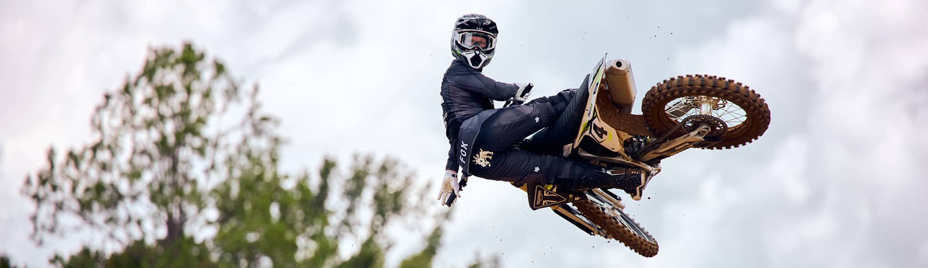 Ricky Carmichael whipping the Triumph TF 450-RC being)