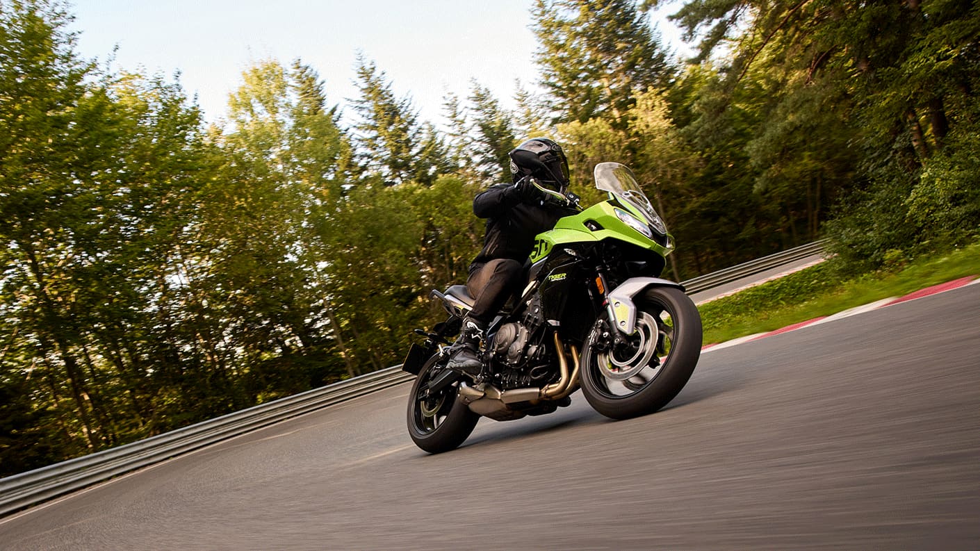 Tiger Sport 660 in Roulette Green riding on twisty road